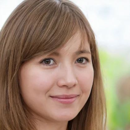 10955b4215d80159d887a9b1bd3823b9 A headshot of a smiling woman with light brown hair